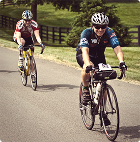 2 people on a bike