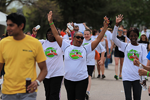 a group of walkers waving